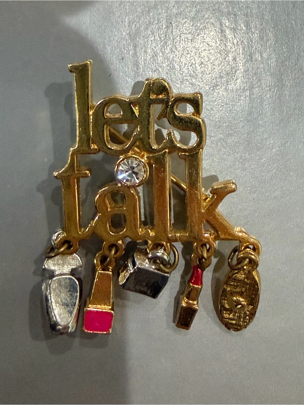 Avon Gold Tone "let's talk" Charm Brooch